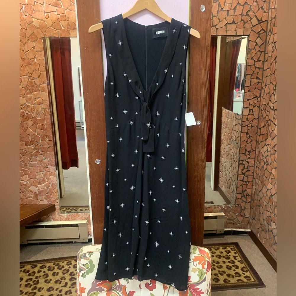 Elegant Black Star-Patterned Dress looks new